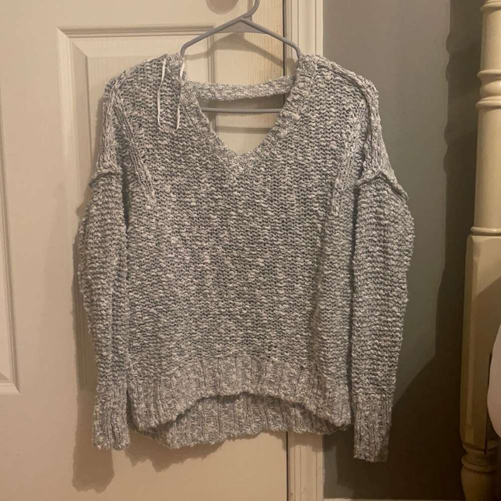 cute sweater with cut outs on the back!
